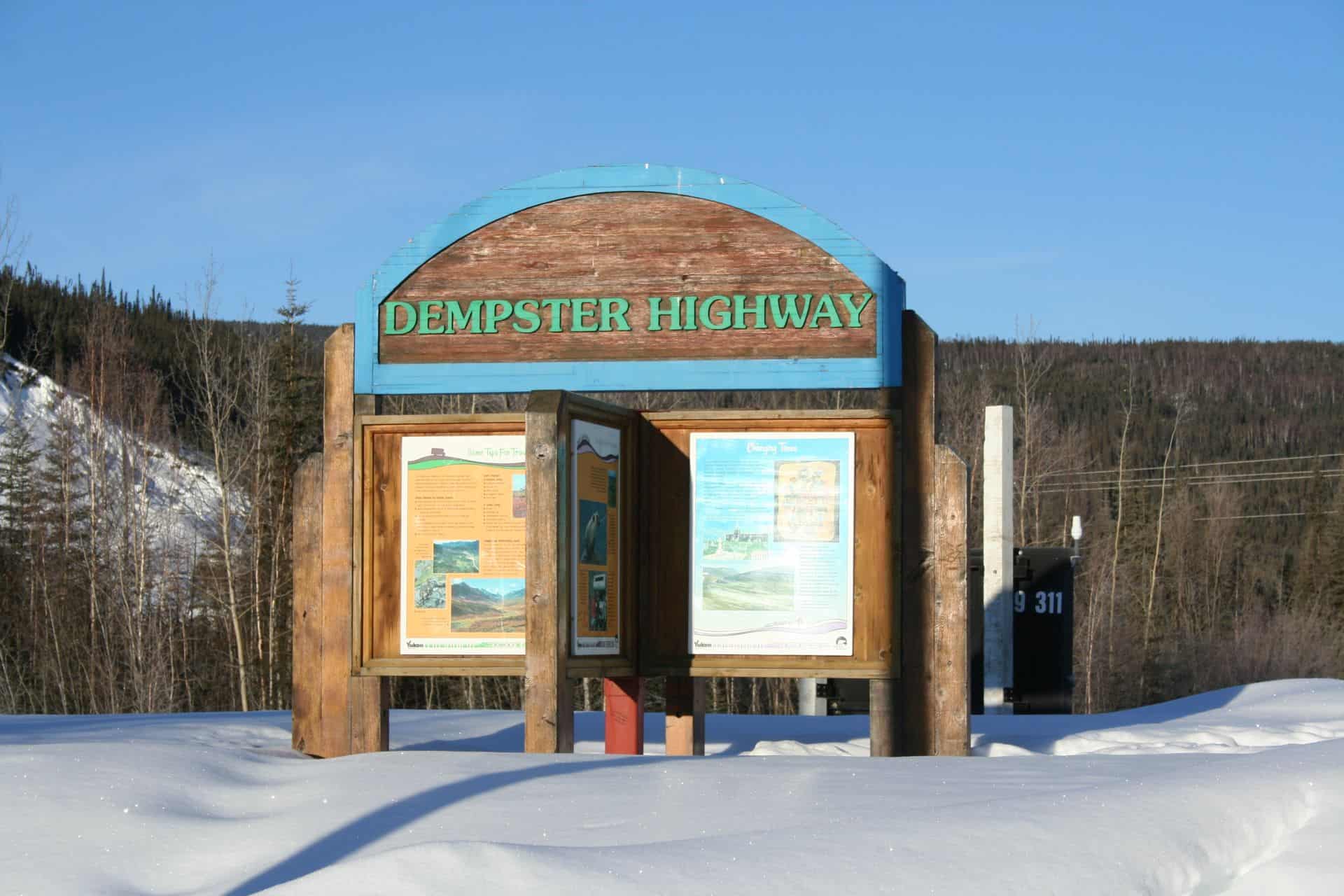 Dempster Highway sign at the start of the road near Dawson City