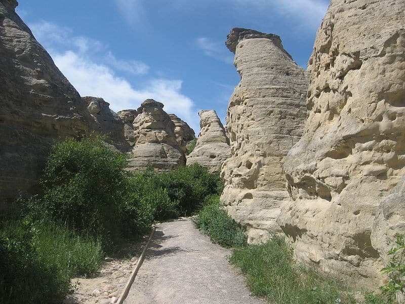 Heilige Felsbildkunst im Writing-on-Stone Provincial Park / Áísínai’pi National Historic Site, Alberta